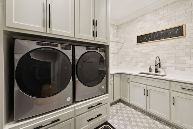 1485 Harrison Rd, Murfreesboro, TN 37128 - laundry room featuring washing machine and clothes dryer and cabinet space