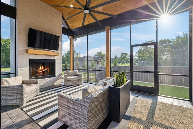 1485 Harrison Rd, Murfreesboro, TN 37128 - sunroom / solarium with a ceiling fan, an outdoor living space with a fireplace, and vaulted ceiling