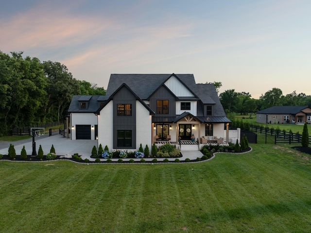 1485 Harrison Rd, Murfreesboro, TN 37128 - modern inspired farmhouse featuring outdoor lounge area, driveway, a standing seam roof, board and batten siding, and a metal roof