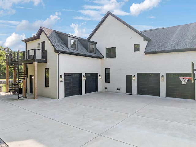 1485 Harrison Rd, Murfreesboro, TN 37128 - view of home's exterior with driveway, stairs, a garage, a balcony, and roof with shingles