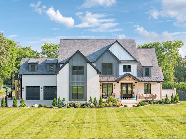 1485 Harrison Rd, Murfreesboro, TN 37128 - view of front of house featuring a standing seam roof, outdoor lounge area, roof with shingles, a metal roof, and board and batten siding