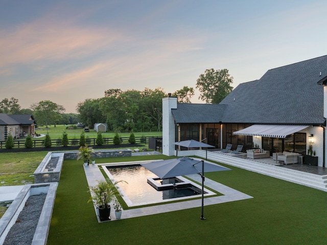 1485 Harrison Rd, Murfreesboro, TN 37128 - yard at dusk featuring a patio, a storage shed, and outdoor lounge area