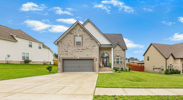 134 Chisum Ct, Clarksville, TN 37043 - traditional home with brick siding, an attached garage, and driveway