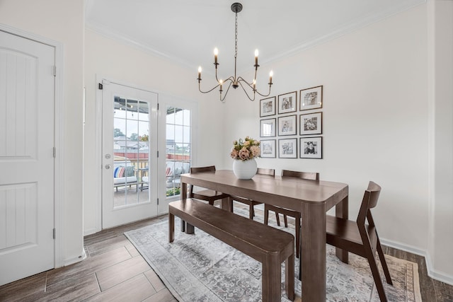 134 Chisum Ct, Clarksville, TN 37043 - dining space featuring a chandelier, ornamental molding, and wood finished floors