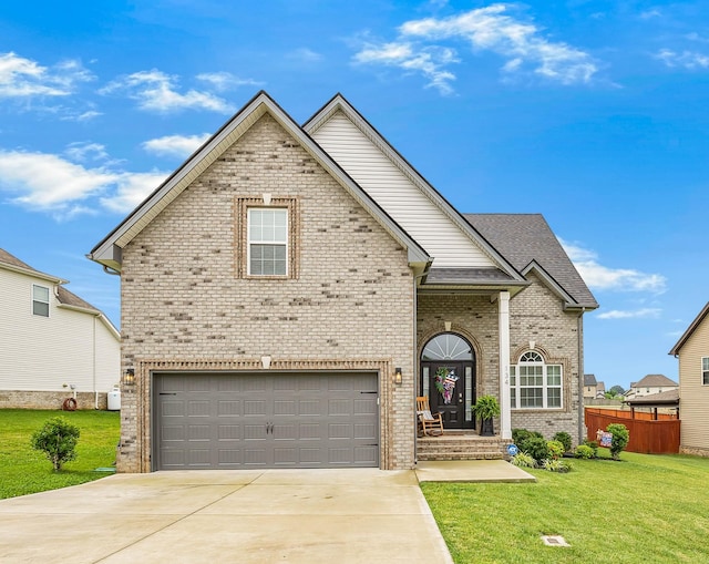 134 Chisum Ct, Clarksville, TN 37043 - traditional-style home featuring brick siding, driveway, and a garage