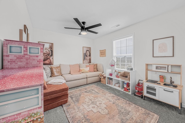 134 Chisum Ct, Clarksville, TN 37043 - carpeted living room featuring a ceiling fan