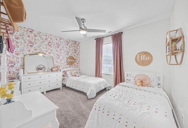 134 Chisum Ct, Clarksville, TN 37043 - carpeted bedroom with wallpapered walls and ceiling fan
