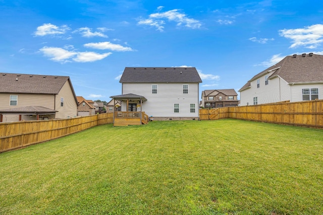 134 Chisum Ct, Clarksville, TN 37043 - back of property with a fenced backyard, a deck, and a residential view