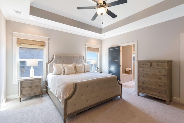 215 Ernest Dr, Lebanon, TN 37087 - bedroom with light colored carpet, a raised ceiling, connected bathroom, a ceiling fan, and recessed lighting