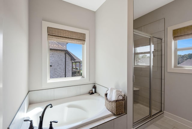 215 Ernest Dr, Lebanon, TN 37087 - full bathroom featuring a garden tub, a stall shower, and tile patterned flooring