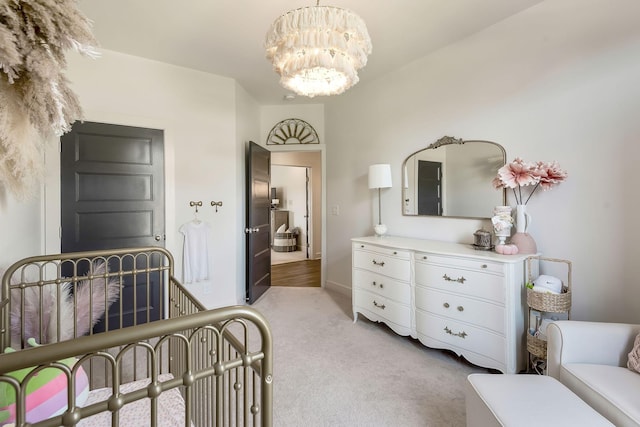 215 Ernest Dr, Lebanon, TN 37087 - bedroom with a chandelier and light carpet