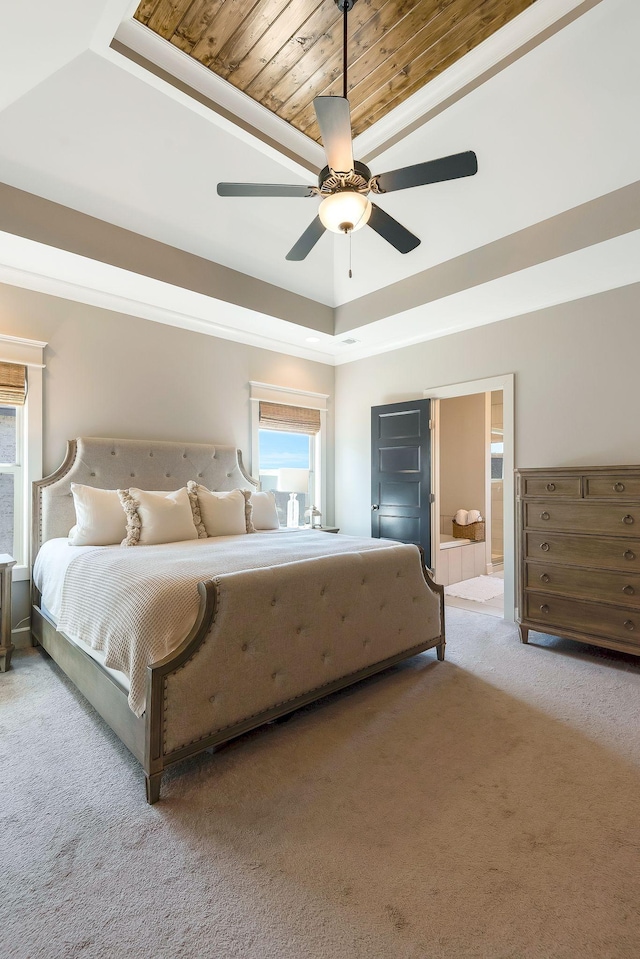 215 Ernest Dr, Lebanon, TN 37087 - bedroom with carpet floors, a raised ceiling, a ceiling fan, and ensuite bath