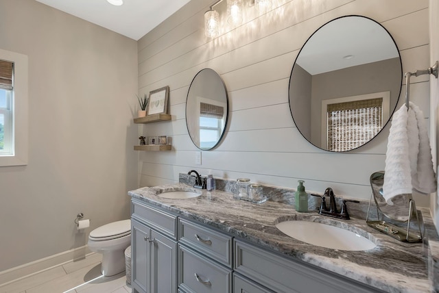 215 Ernest Dr, Lebanon, TN 37087 - full bath featuring double vanity, tile patterned flooring, and wooden walls