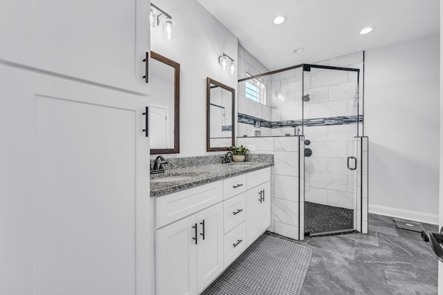 1055 Wittys Way, Clarksville, TN 37043 - bathroom featuring double vanity, a stall shower, recessed lighting, and marble finish flooring