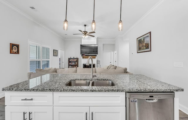 1055 Wittys Way, Clarksville, TN 37043 - kitchen with dishwasher, open floor plan, dark wood-style flooring, crown molding, and light stone counters