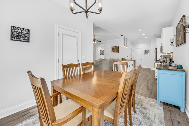 1055 Wittys Way, Clarksville, TN 37043 - dining room featuring a chandelier, light wood-type flooring, ceiling fan, and recessed lighting