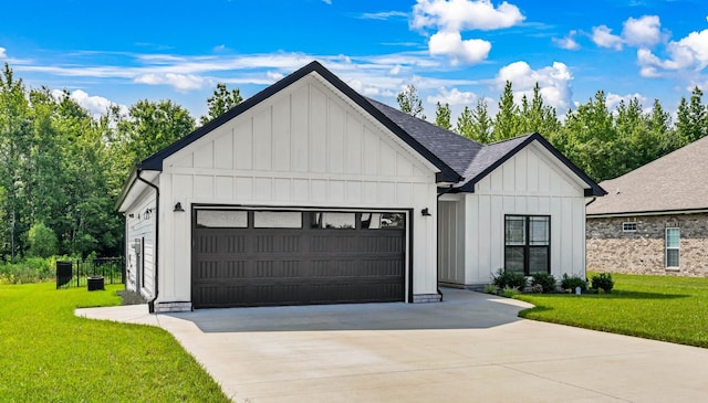1055 Wittys Way, Clarksville, TN 37043 - modern farmhouse with board and batten siding, a front lawn, an attached garage, and driveway