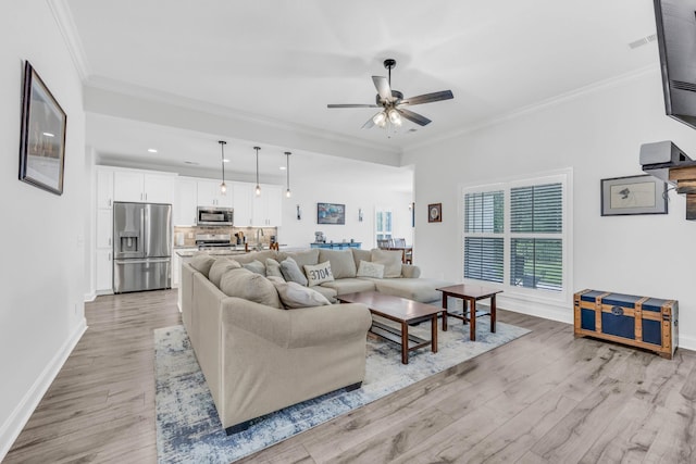 1055 Wittys Way, Clarksville, TN 37043 - living area with ceiling fan, light wood-type flooring, crown molding, and recessed lighting