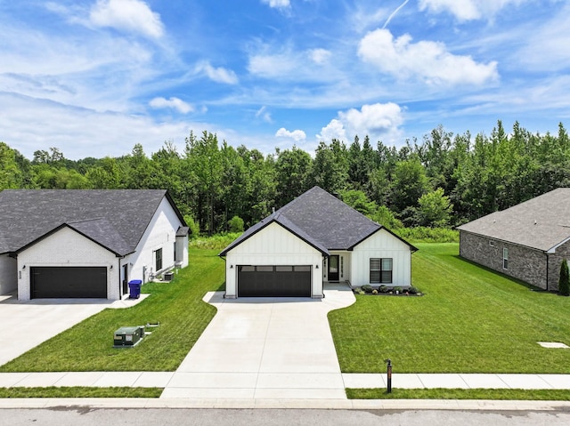 1055 Wittys Way, Clarksville, TN 37043 - modern farmhouse with board and batten siding, a front lawn, driveway, and an attached garage