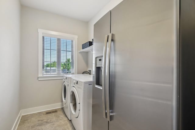 2016 Oliver Dr, Mount Juliet, TN 37122 - washroom with washer and dryer and light tile patterned floors
