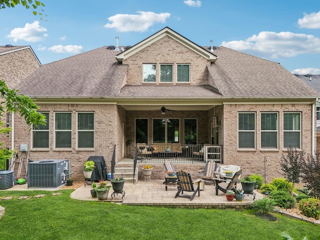 2016 Oliver Dr, Mount Juliet, TN 37122 - rear view of house featuring a patio area, a yard, brick siding, roof with shingles, and a ceiling fan