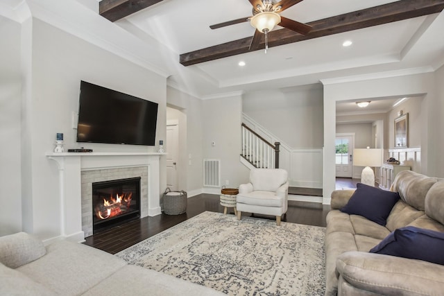 2016 Oliver Dr, Mount Juliet, TN 37122 - living area with wood finished floors, a ceiling fan, stairs, beam ceiling, and a tile fireplace