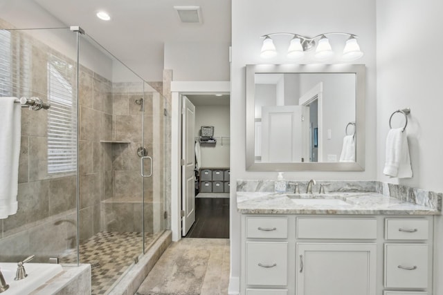 2016 Oliver Dr, Mount Juliet, TN 37122 - full bath with a stall shower, vanity, and tiled tub