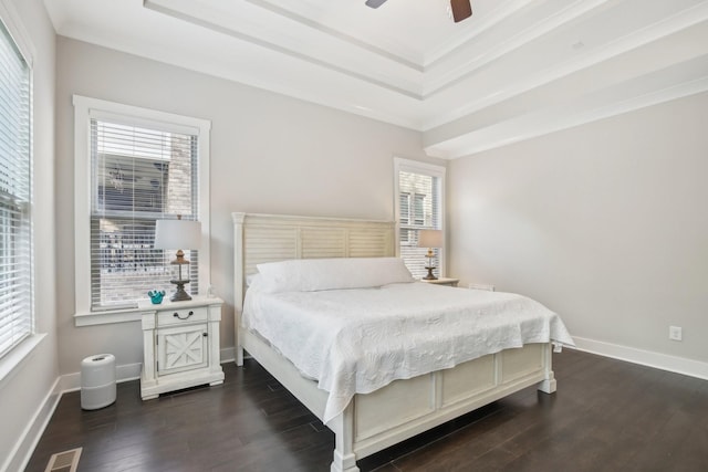 2016 Oliver Dr, Mount Juliet, TN 37122 - bedroom with dark wood-type flooring, a tray ceiling, and a ceiling fan