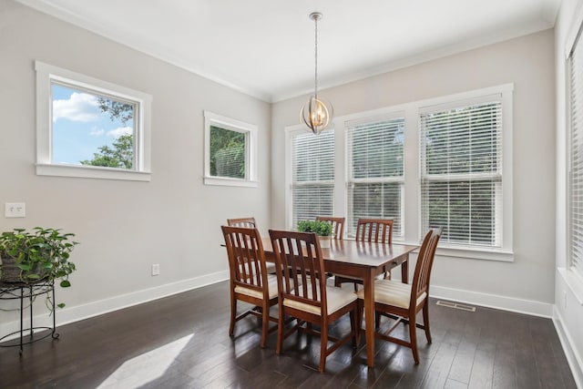 2016 Oliver Dr, Mount Juliet, TN 37122 - dining space with a chandelier, dark wood-style floors, and ornamental molding