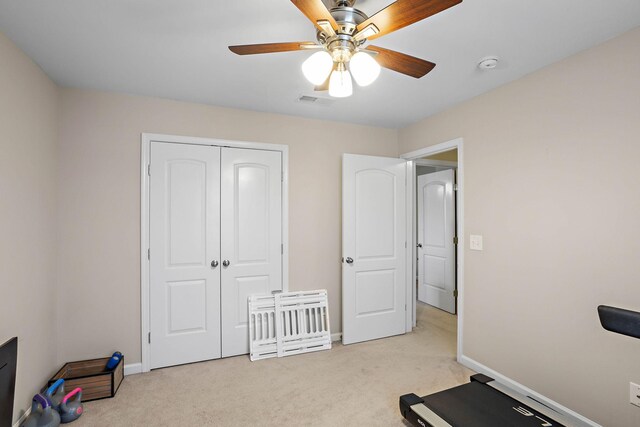 341 Lola Ln, Cottontown, TN 37048 - exercise room featuring light colored carpet and a ceiling fan