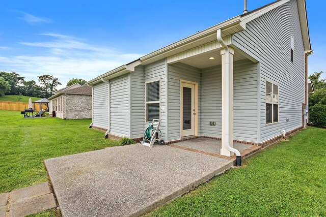 341 Lola Ln, Cottontown, TN 37048 - back of house with a patio and a yard