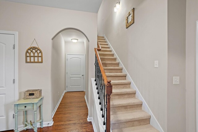 341 Lola Ln, Cottontown, TN 37048 - stairs with arched walkways and wood finished floors