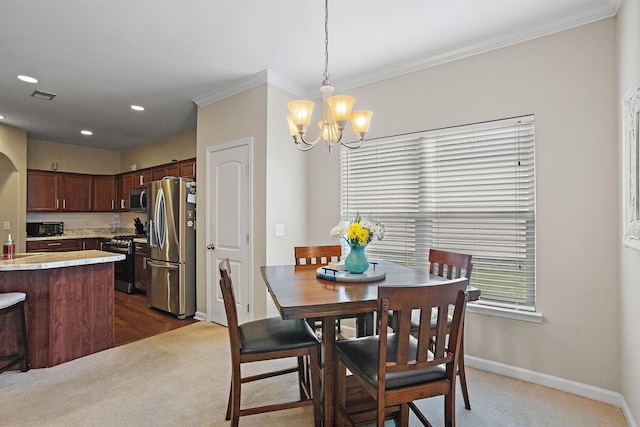 341 Lola Ln, Cottontown, TN 37048 - dining area featuring dark colored carpet, a chandelier, ornamental molding, and recessed lighting