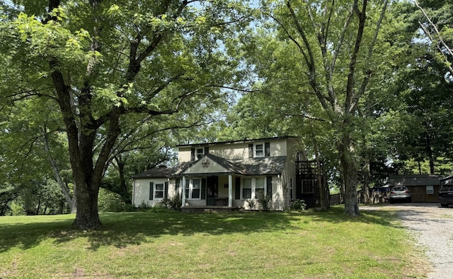 972 Weeping Willow Rd, Hendersonville, TN 37075 - traditional-style house featuring a porch, gravel driveway, and a front lawn