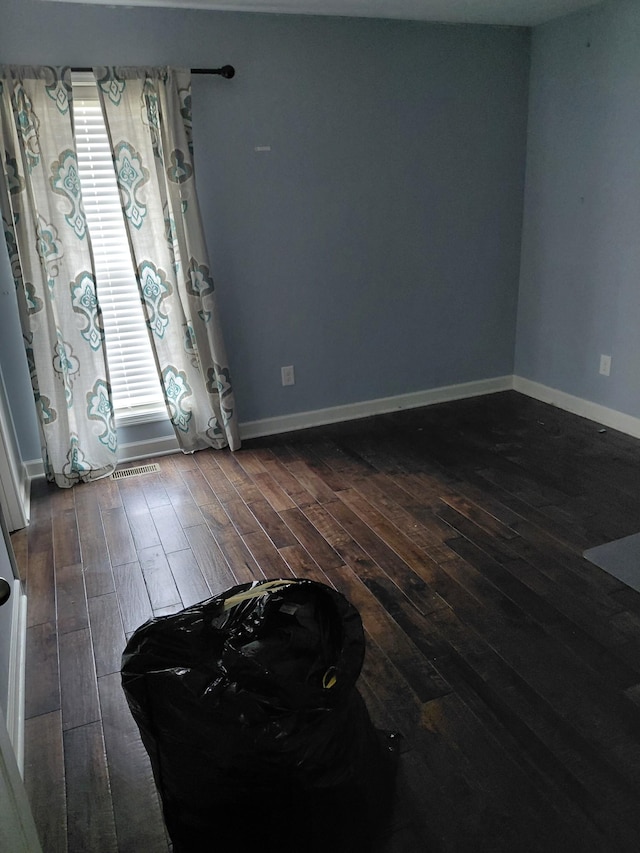179 Avalon Dr, Gallatin, TN 37066 - empty room with dark wood finished floors