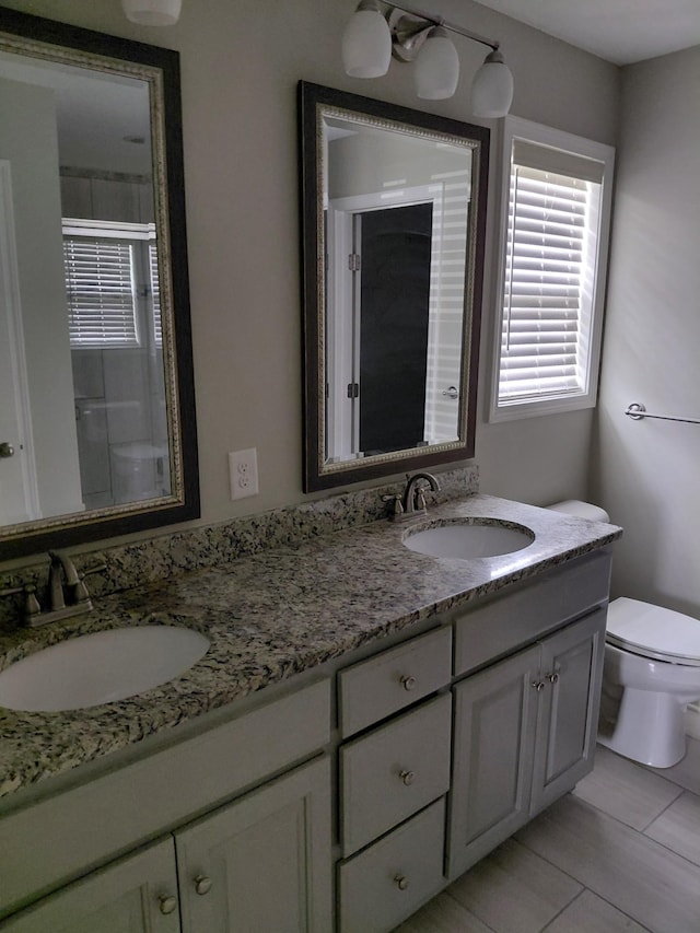 179 Avalon Dr, Gallatin, TN 37066 - full bathroom with double vanity and an enclosed shower
