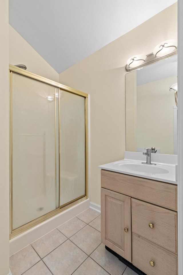 3604 Gentry Station Dr, Signal Mountain, TN 37377 - bathroom with vanity, a stall shower, tile patterned flooring, and lofted ceiling