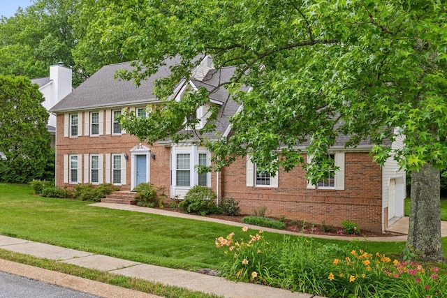 3604 Gentry Station Dr, Signal Mountain, TN 37377 - colonial house with brick siding, a front lawn, and a shingled roof