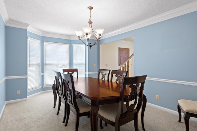 3604 Gentry Station Dr, Signal Mountain, TN 37377 - dining room featuring a chandelier, a textured ceiling, healthy amount of natural light, stairs, and light carpet