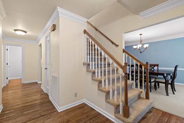 3604 Gentry Station Dr, Signal Mountain, TN 37377 - staircase with wood finished floors, a chandelier, and crown molding