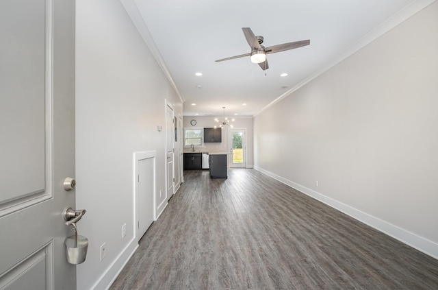 121 Bellvue Dr, Lebanon, TN 37090 - unfurnished living room featuring ornamental molding, recessed lighting, dark wood finished floors, a ceiling fan, and a chandelier