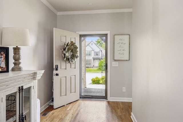 1005 Rudder Dr, Spring Hill, TN 37174 - entrance foyer featuring wood finished floors and crown molding