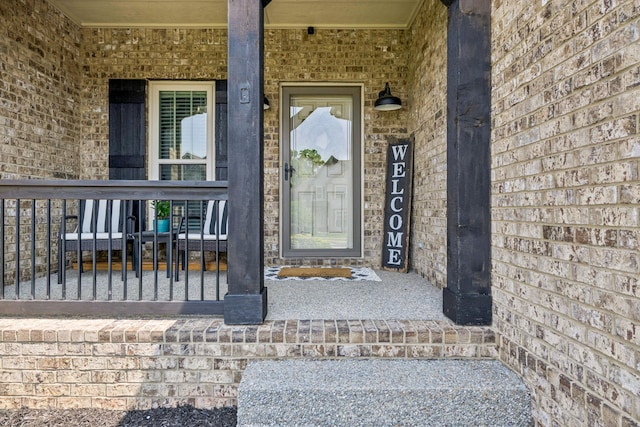 1005 Rudder Dr, Spring Hill, TN 37174 - entrance to property with a porch and brick siding