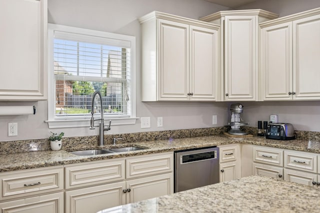 1005 Rudder Dr, Spring Hill, TN 37174 - kitchen featuring dishwasher and light stone countertops