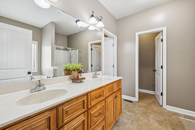 1005 Rudder Dr, Spring Hill, TN 37174 - full bath featuring a stall shower, double vanity, and a garden tub