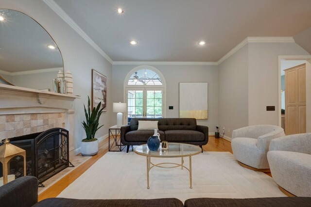 101 Oak Dr, Waverly, TN 37185 - living area featuring wood finished floors, a fireplace, recessed lighting, and ornamental molding