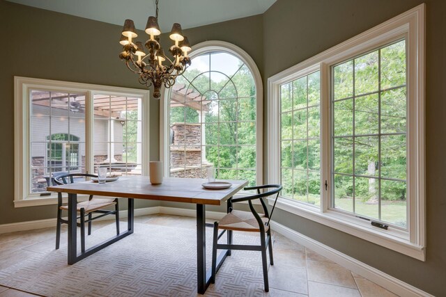 101 Oak Dr, Waverly, TN 37185 - dining space with a chandelier, light tile patterned flooring, and vaulted ceiling