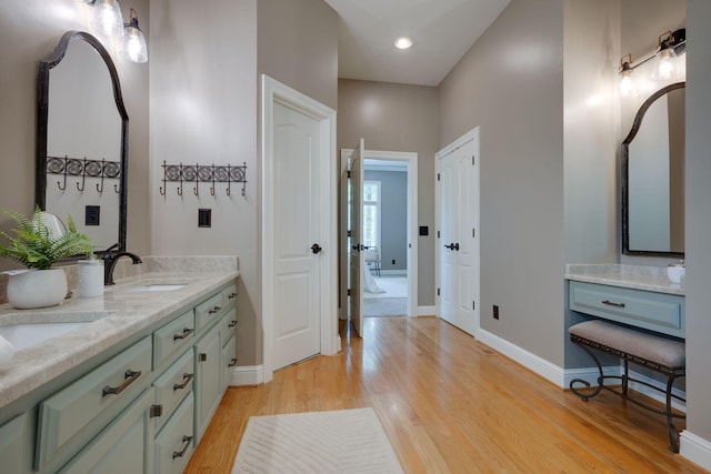 101 Oak Dr, Waverly, TN 37185 - bathroom with wood finished floors, double vanity, and recessed lighting