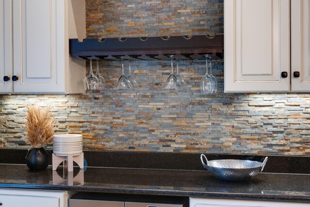 101 Oak Dr, Waverly, TN 37185 - kitchen featuring tasteful backsplash and white cabinetry