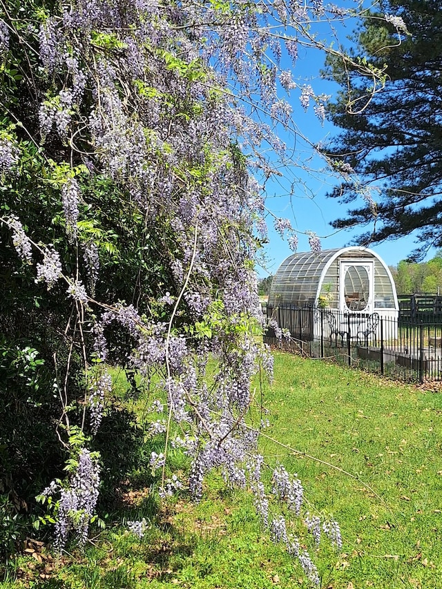 2600 Clanton Rd, Lawrenceburg, TN 38464 - view of yard with a greenhouse and an outdoor structure